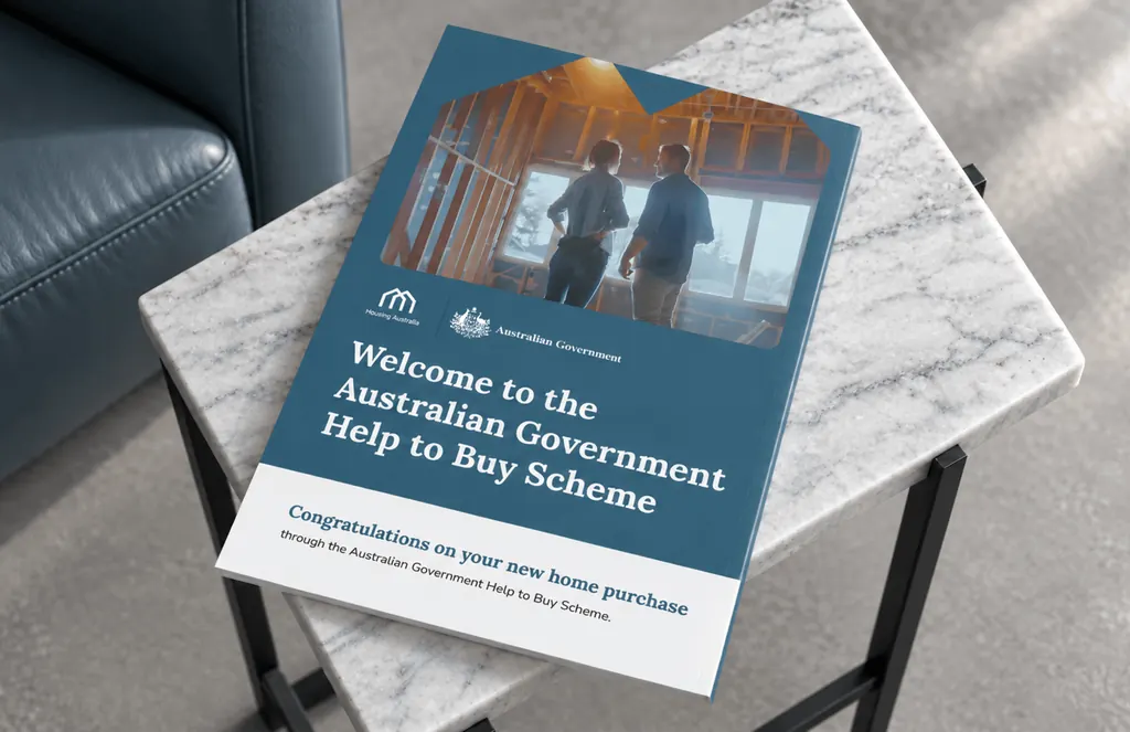 Welcome to the Australian Government Help to Buy Scheme booklet on a marble side table