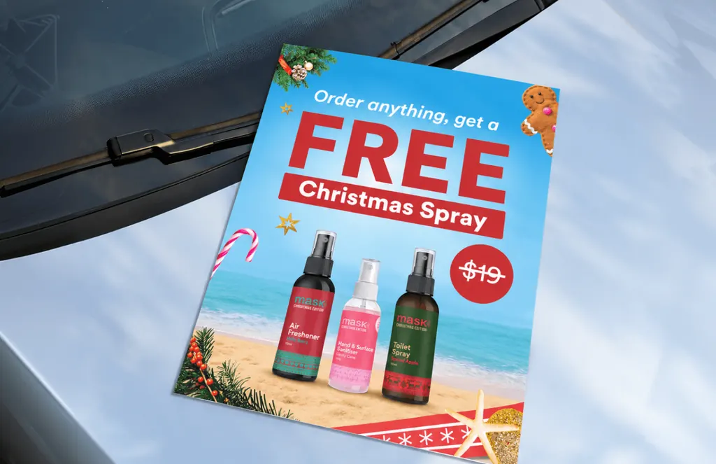 MaskCo flyer on a car bonnet: order anything, get a free Christmas spray, with three sprays on a beach